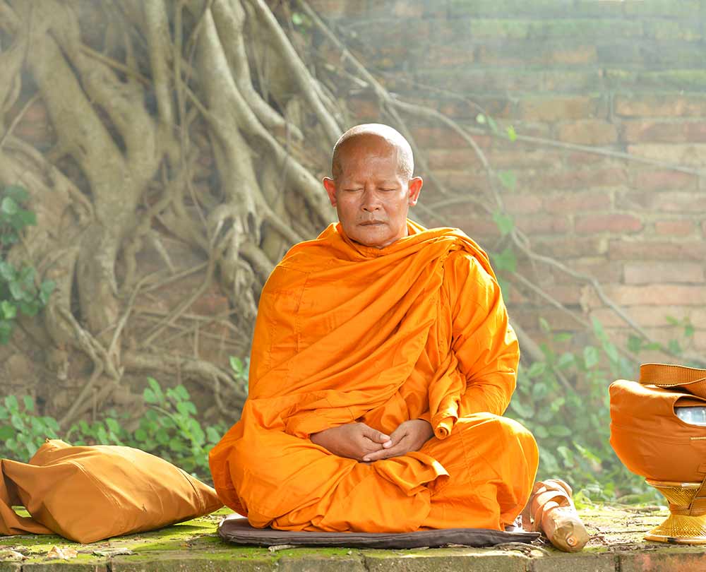 Meditation verbessert die Darmflora und stärkt das Immunsystem Beutragsbild: Bild von einem Mönch beim Meditieren